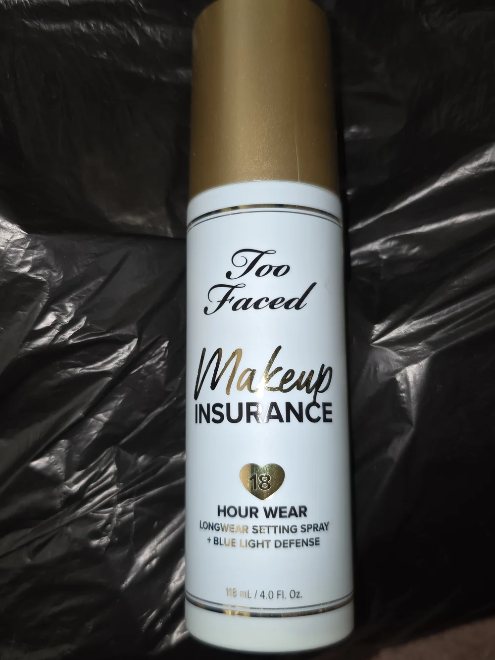 Too Faced Makeup Insurance Setting Spray — White & Gold